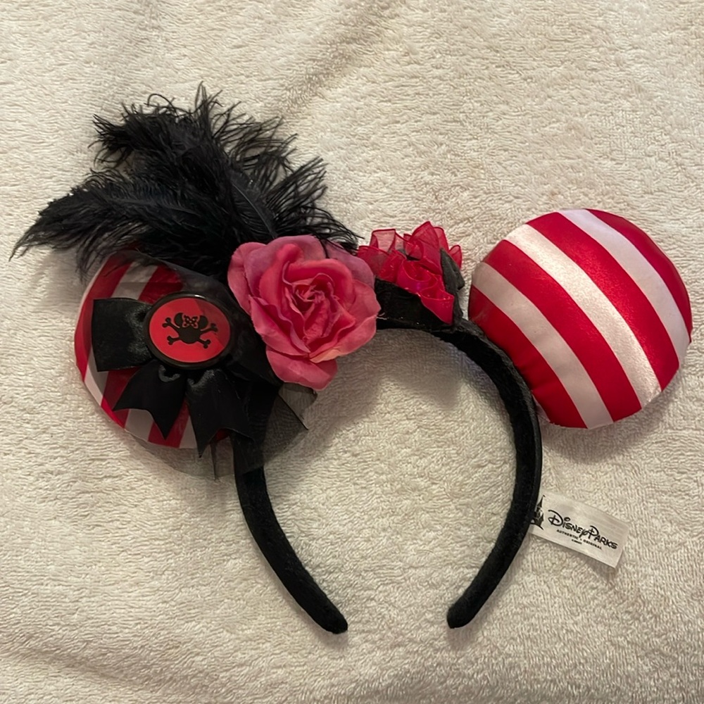 Disney parks pirate ears with feather plume. No longer sold smoke-free home.